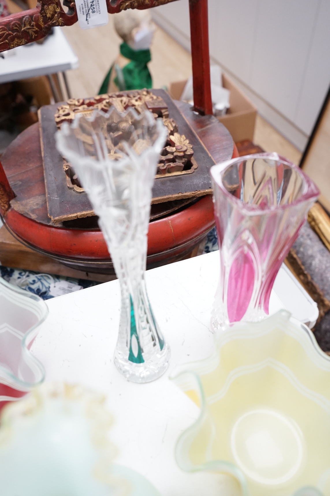 Mixed glassware to include a green Mary Gregory jug, a 'vaseline' glass ewer, an Art Deco style clear and black glass fruit tazza, etc.